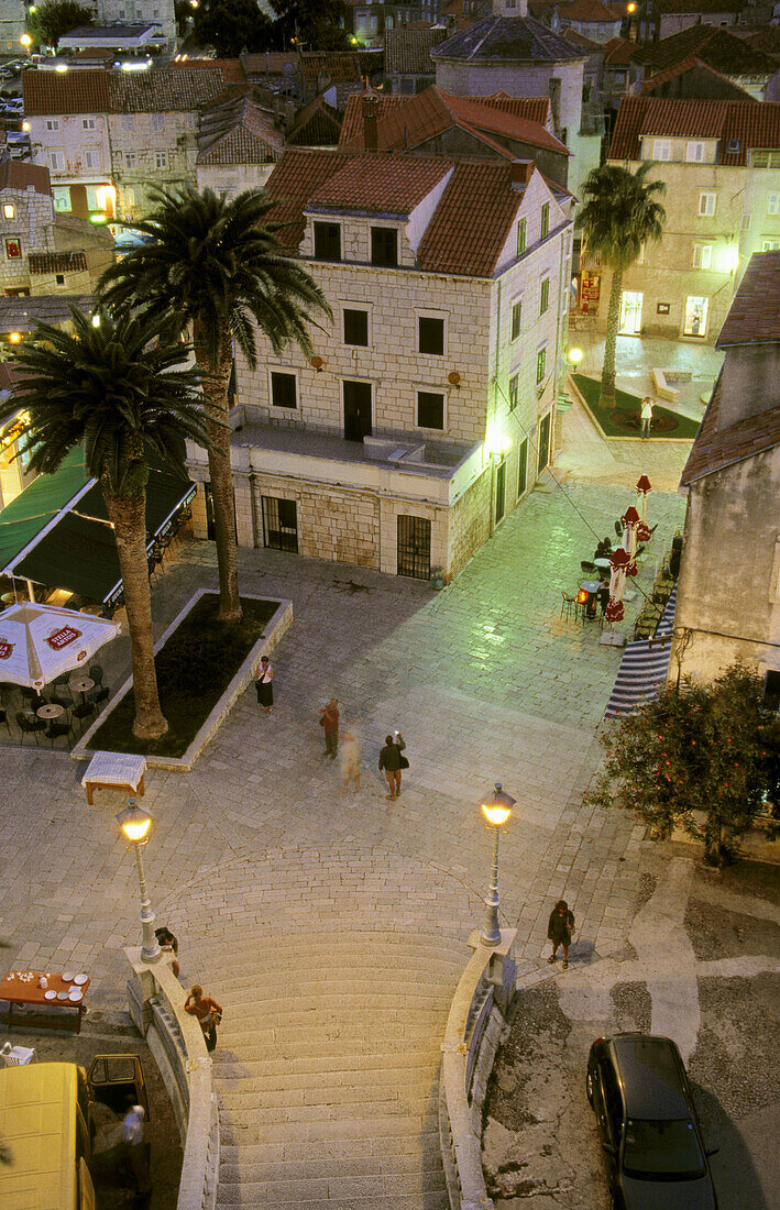 Trg kralja Tomislava (square) at night from atop Veliki Revelin tower, Korcula town. Korcula Island, Dalmatia. Croatia