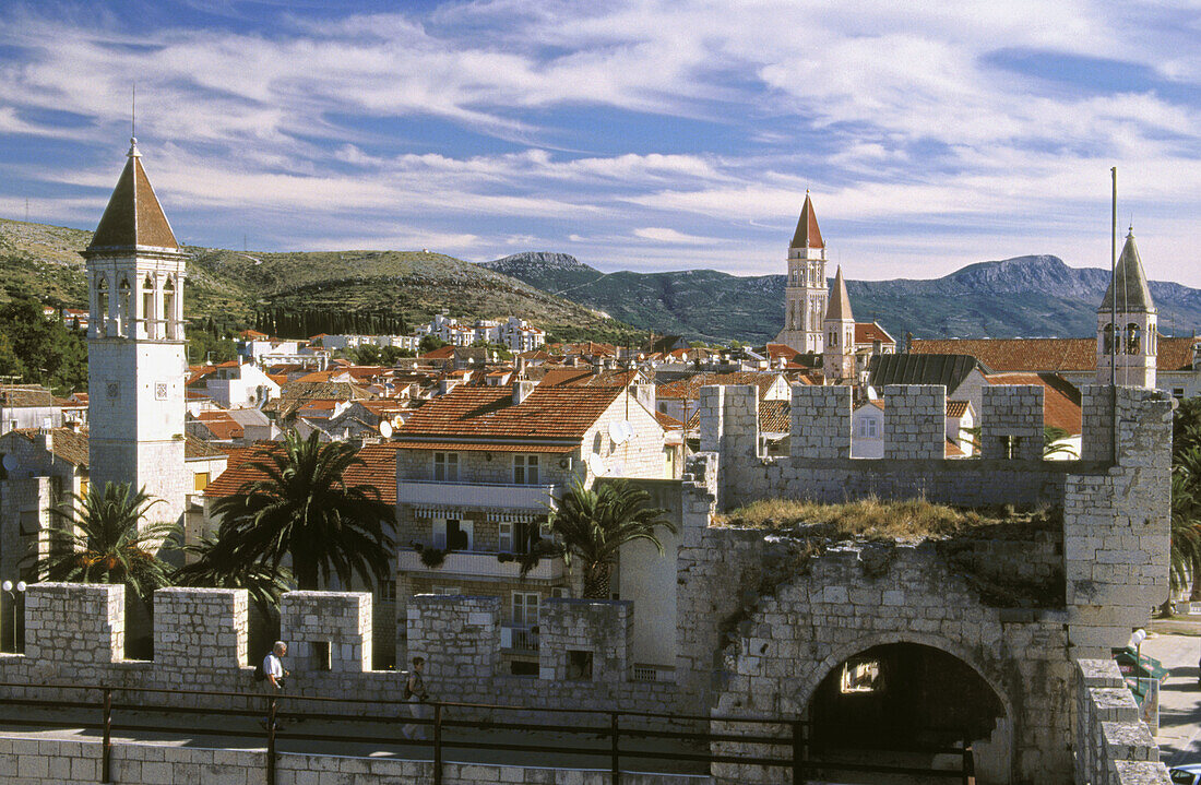 Belfry of church of St. Michael on the left is one of many bell towers in Trogir, all of which is seen from the top of the main tower at Kamerlengo fortress. Trogir, central Dalmatia. Croatia
