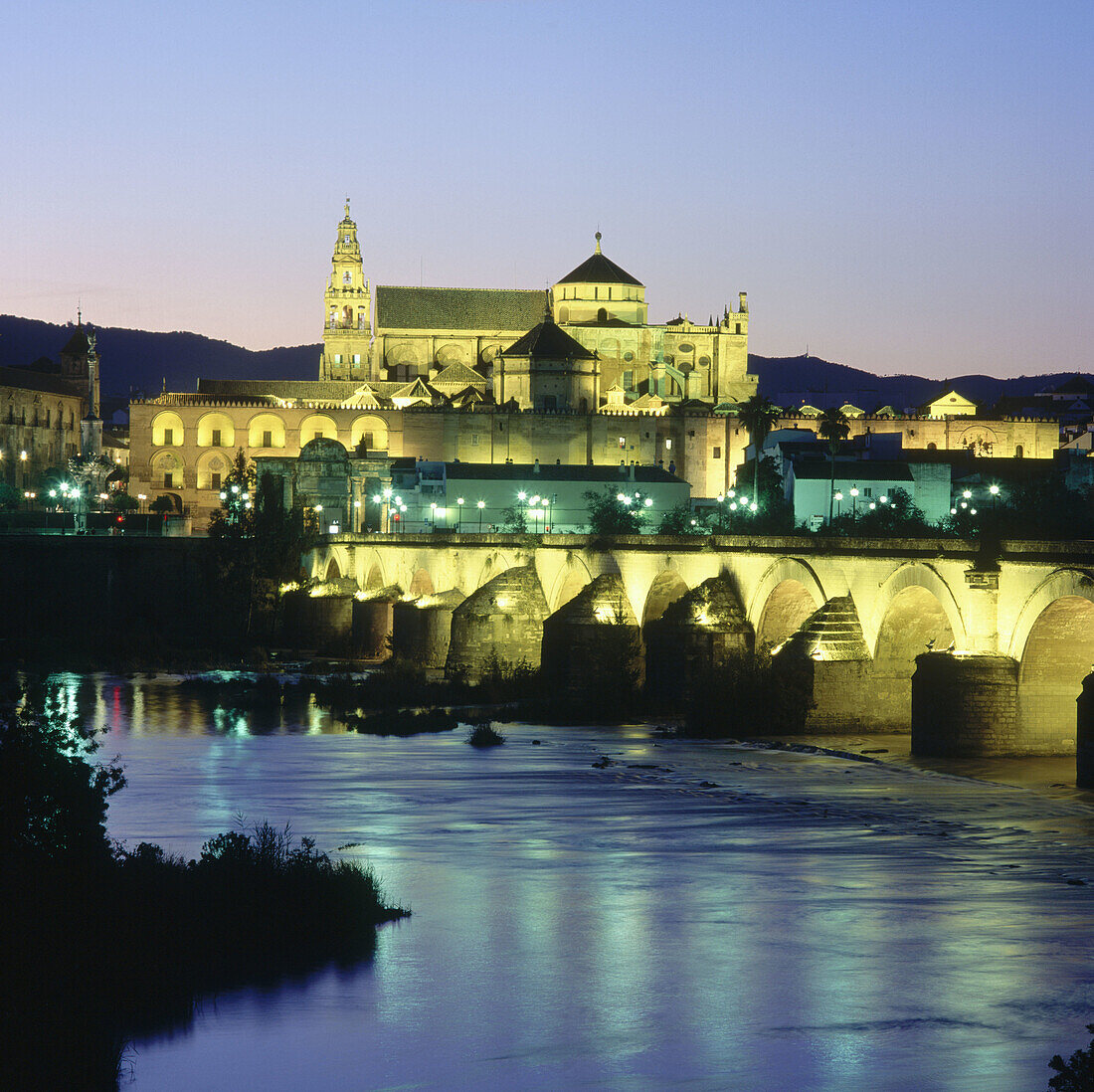 Mosque-cathedral and Roman bridge over Guadalquivir river. Córdoba. Andalucía. Spain.