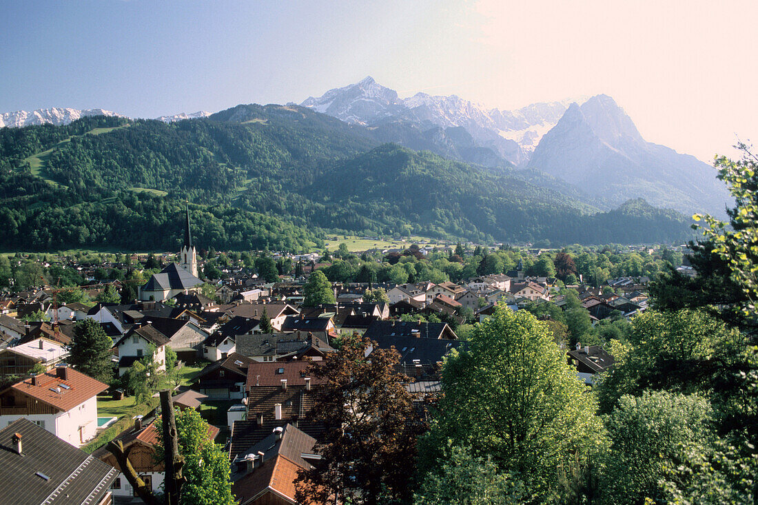 View over Partenkirchen to mountains Zugspitze and Alpspitze, Garmisch-Partenkirchen, Bavaria, Germany