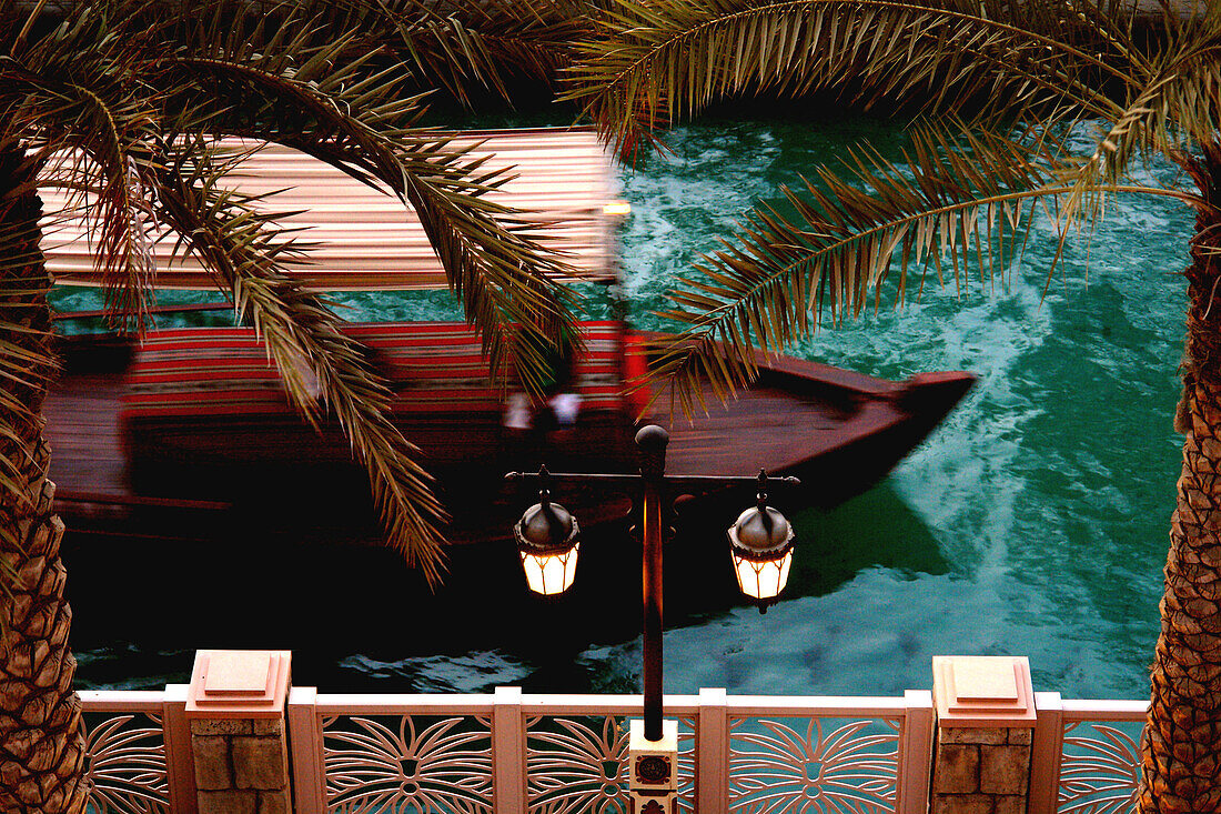 Abra, taxi boat cruising across Dubai Creek, Madinat Jumeirah, Dubai, United Arab Emirates, UAE