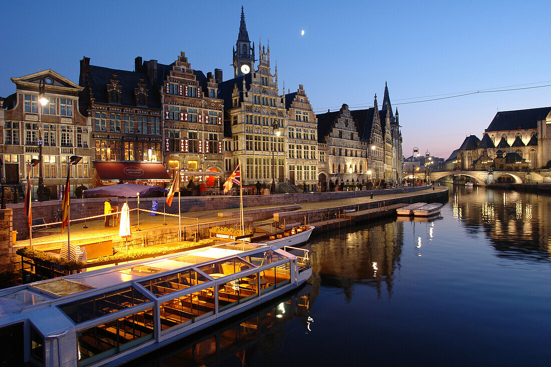 Old Town of Ghent at night with reflection in the water, Flanders, Belgium