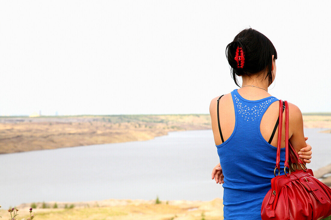 Young woman looking at view, Leipzig, Saxony, Germany