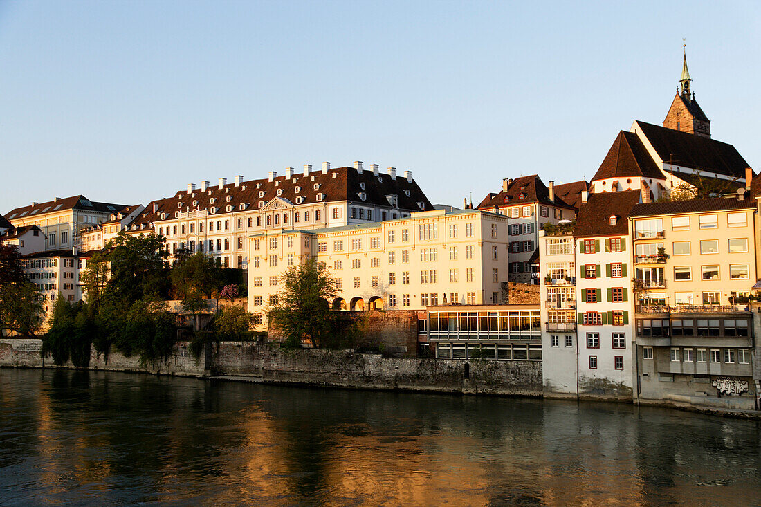 Riverbank with St. Martins Church in the background, River Rhine, Basel, Switzerland