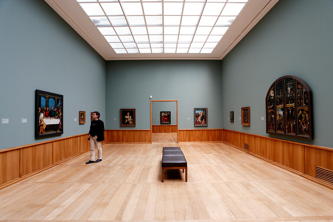 A man looking at paintings in an Art Museum, Kunstmuseum Basel, Holbein, Basel, Switzerland