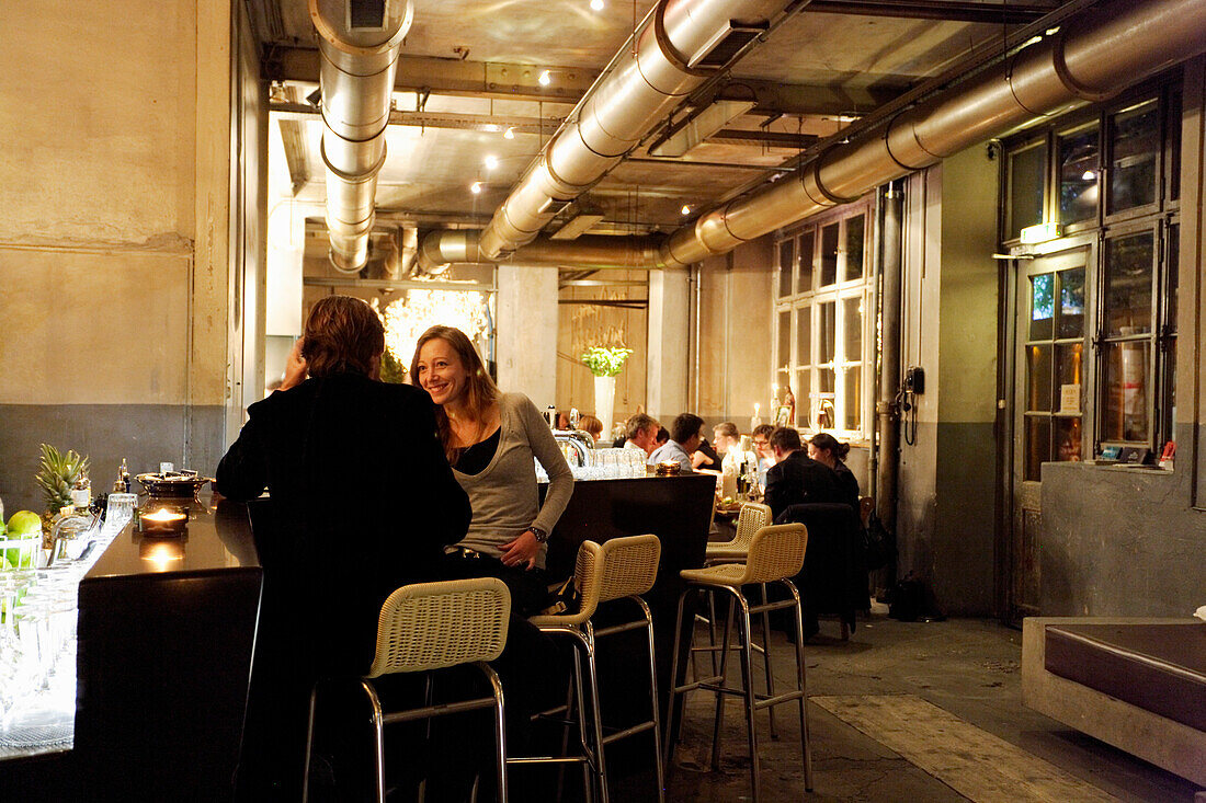 A couple enjoying a drink in Acqua Lounge, Restaurant, Basel, Switzerland