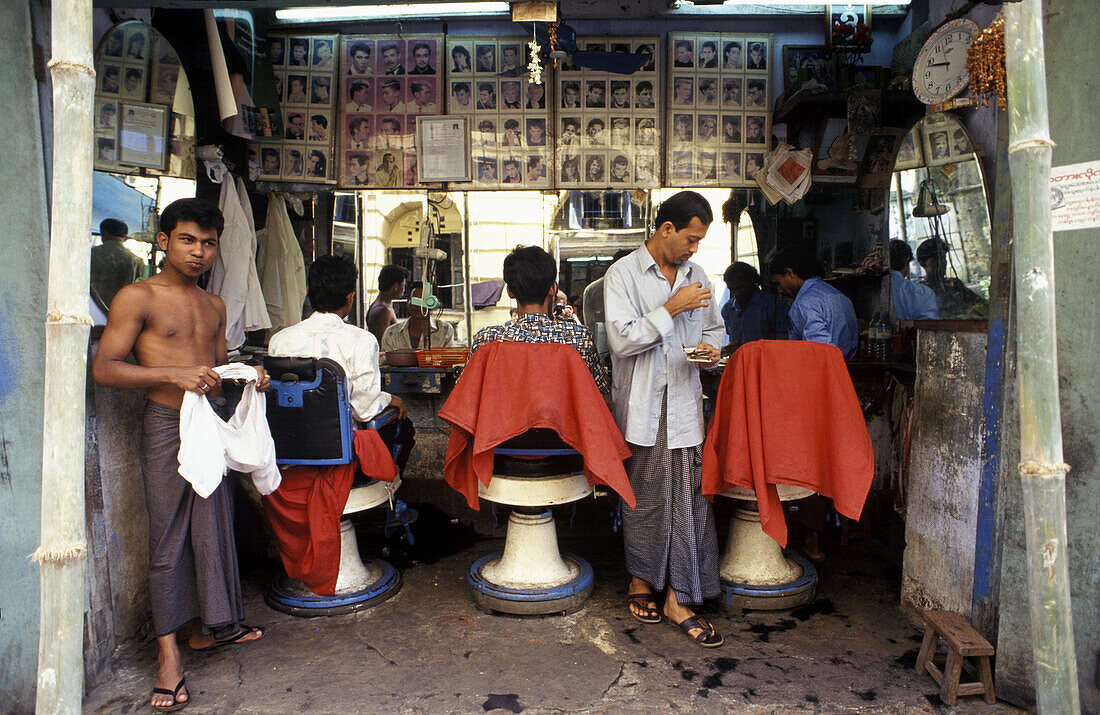 Hairdresser in downtown Yangoon (Rangoon). Myanmar