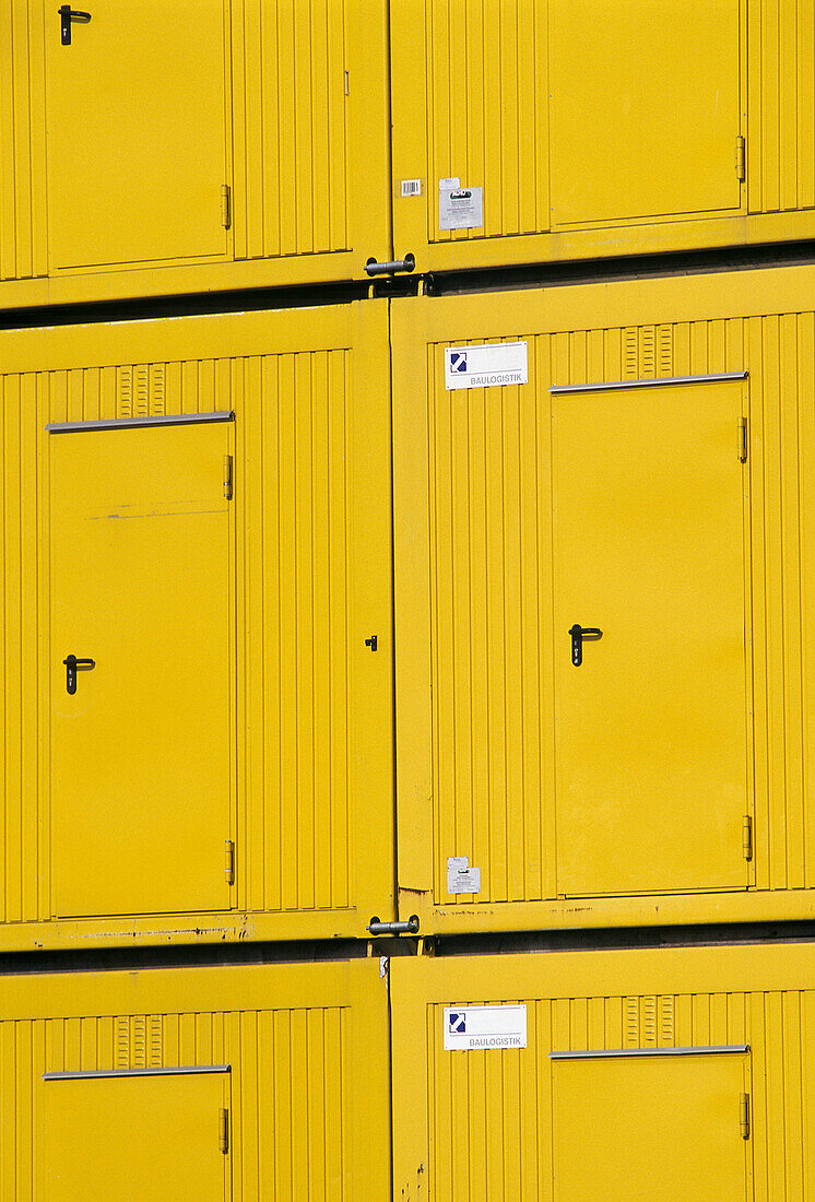 Piled up container-offices for workers at construction side