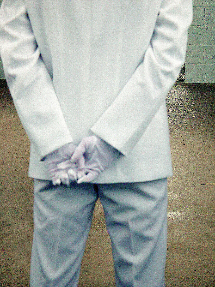 Midshipman at the US Naval Academy in summer whites at commencement