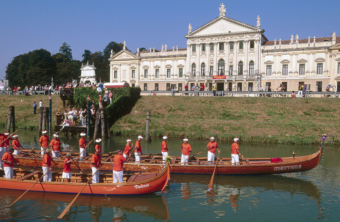 Regata storica traditional boat race in front of Villa Pisani, Brenta river canal bank. Veneto, Italy