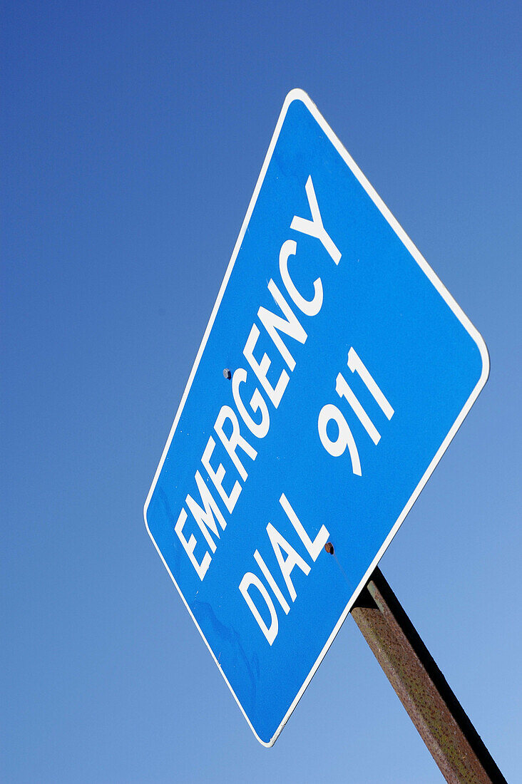  Aid, Blue, Blue sky, Color, Colour, Daytime, Emergencies, Emergency, Emergency Dial 911, Exterior, Help, Information, Low angle view, Outdoor, Outdoors, Outside, Road, Road sign, Road Signs, Roads, Safety, Security, Skies, Sky, Telephone number, Telephon