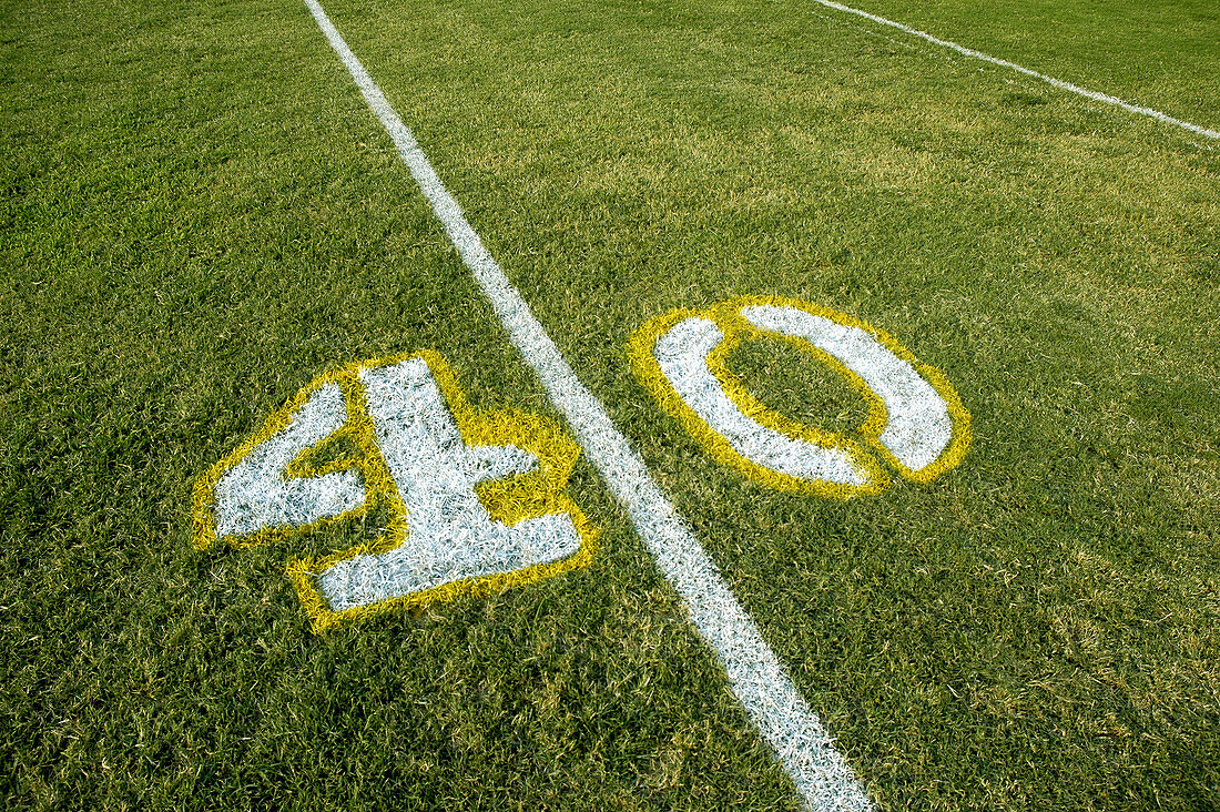 Painted yardage lines of football field, some being painted 40