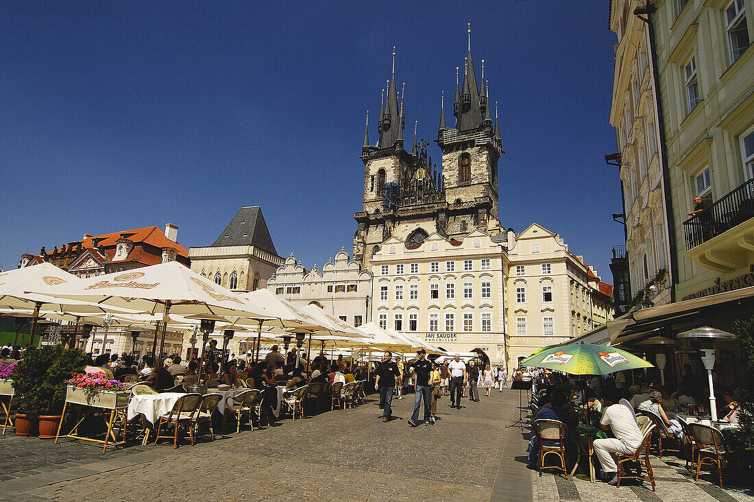 Outdoor cafe in Prague s Old Town Square with the Church of our Lady before Tyn in the background. Czech Republic. 2006.