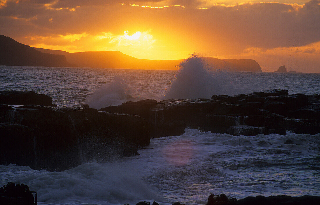 Sonnenuntergang an der wilden Küste, Neuseeland