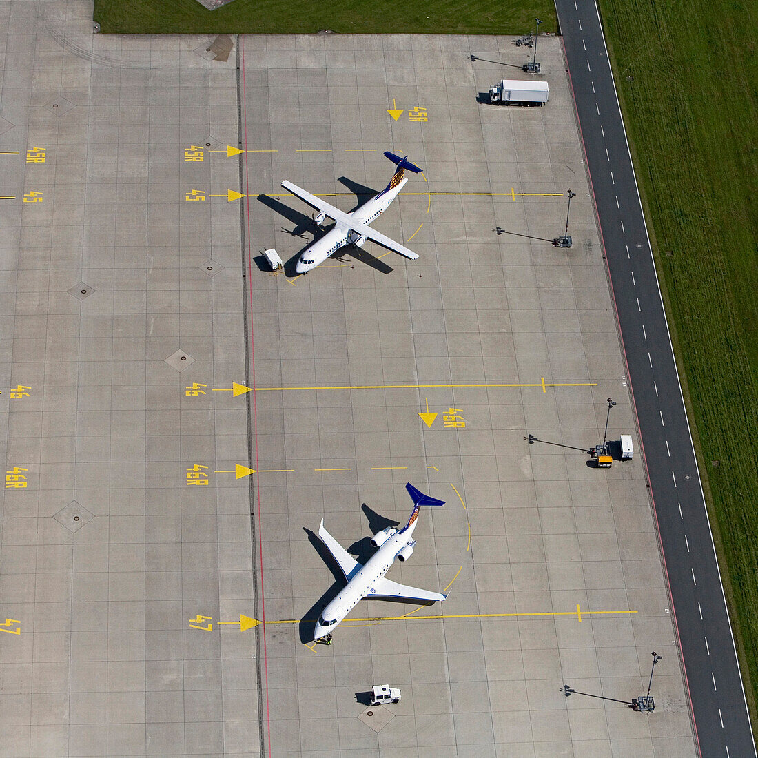 Aerial shots of airplanes on airfield, Hanover/Langenhagen International Airpor, Hanover, Lower Saxony, Germany