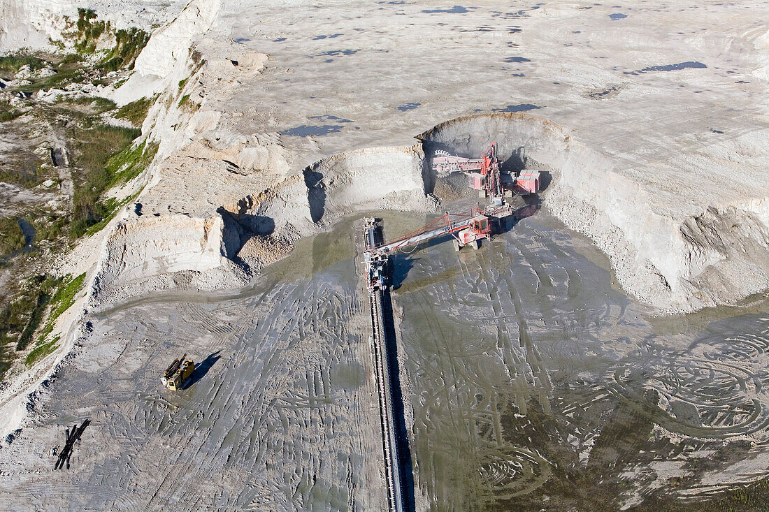 aerial view of open-cast mine and earthmover at a marl pit, Misburg, Hanover, Lower Saxony, northern Germany