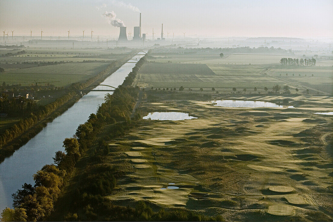 Aerial shot of Mittelland Kanal (midland canal) and coal-fired power plant, Mehrum, Lower Saxony, Germany