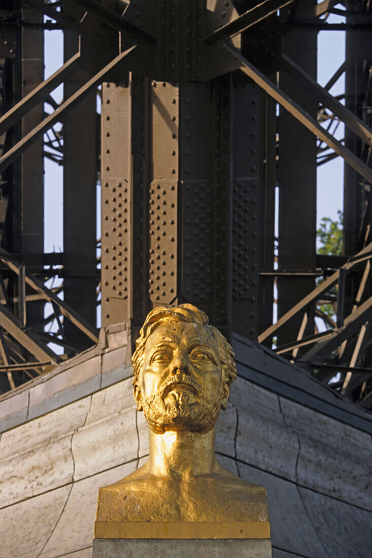 Bust of Gustave Eiffel in front of Eiffel Tower, 1889, Paris, France