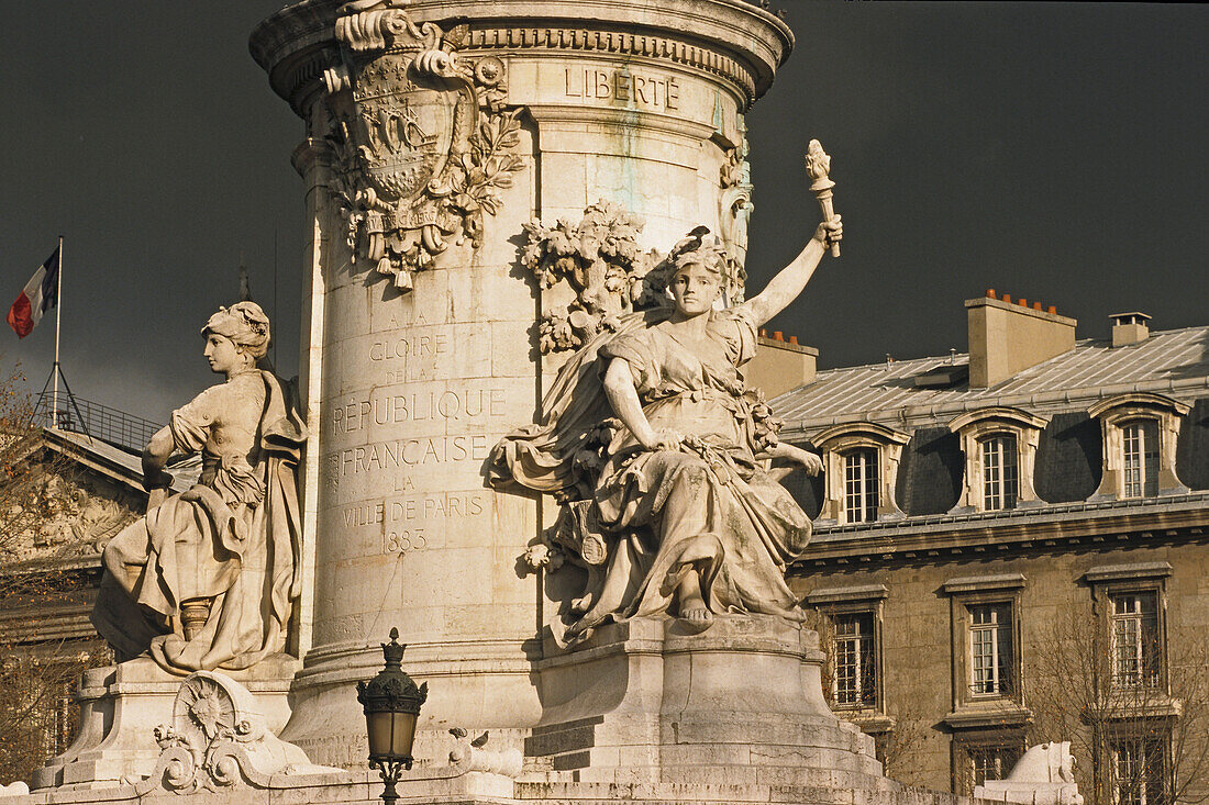 View at the socle of the Statue of the Republic under grey clouds, Place de la Republique, 3. Arrondissement, Paris, France, Europe