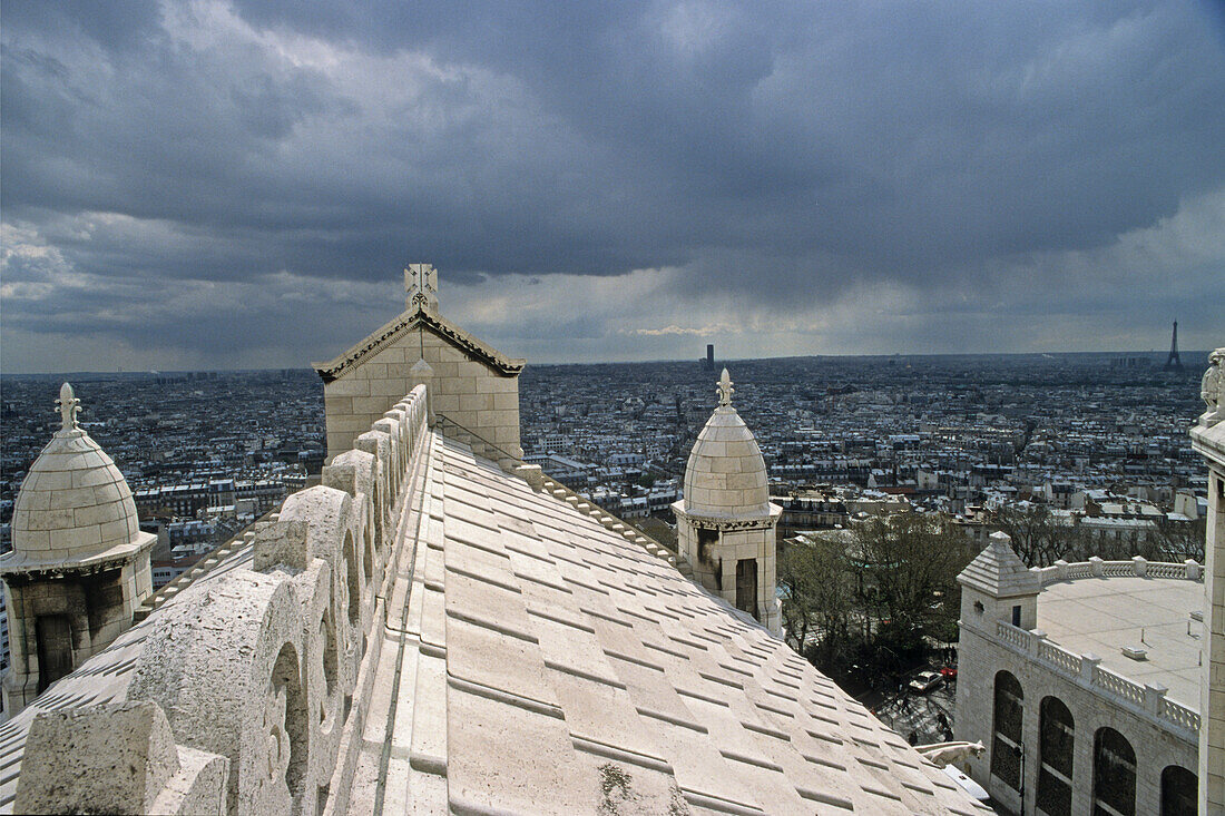 Detail of basilica Sacre Coeur under clouded sky, Montmartre, Paris, France, Europe