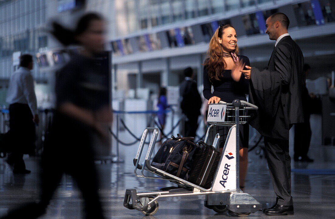 Business people travelling at Frankfurt Airport, Frankfurt, Germany