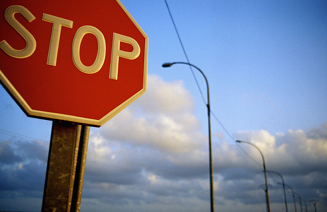 Close up, Close-up, Closeup, Cloud, Clouds, Color, Colour, Concept, Concepts, Daytime, Exterior, Horizontal, Obligation, Obligations, Outdoor, Outdoors, Outside, Road, Road sign, Road Signs, Roads, Skies, Sky, Stop, Street lamp, Street lamps, Thoroughfare