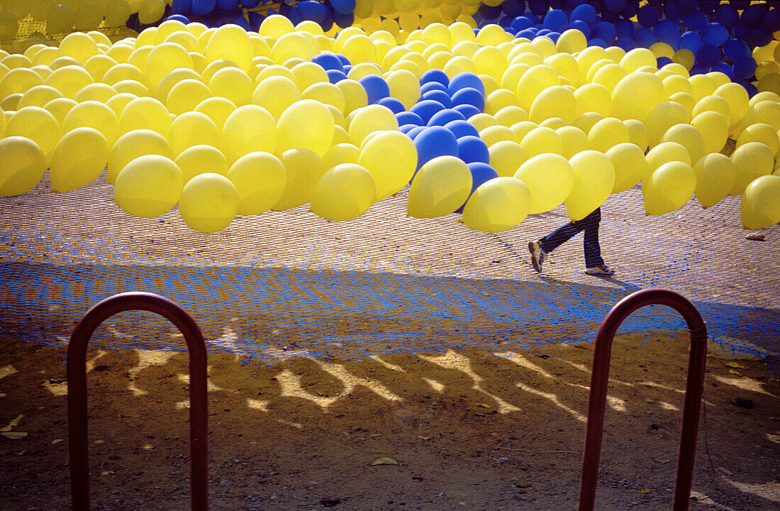 Balloon, Balloons, Childhood, Color, Colour, Contemporary, Daytime, Exterior, Fair, Fairs, Horizontal, Infantile, Leisure, Many, Outdoor, Outdoors, Outside, Parties, Party, Recreation, Yellow, L55-307074, agefotostock