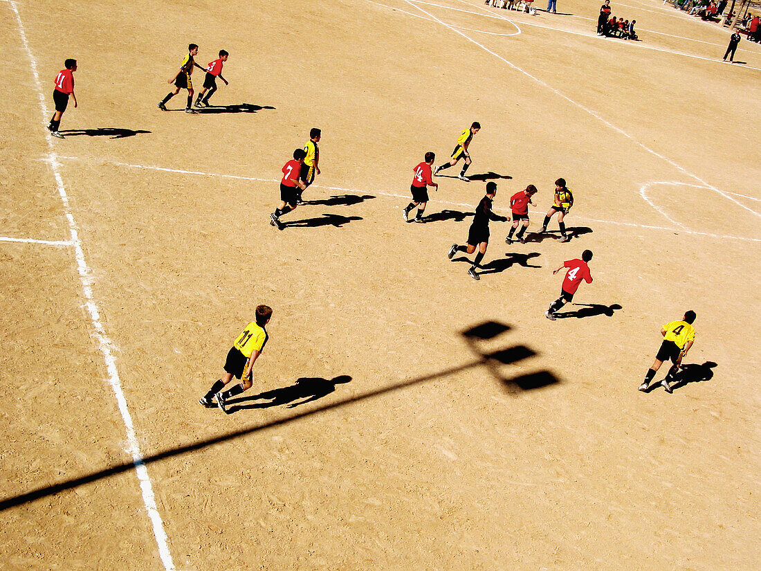 Activity, Color, Colour, Comunidad Valenciana, Contemporary, Daytime, Earth, Europe, Exterior, Football, Football ground, Game, Games, Horizontal, Human, Leisure, Match, Matches, Outdoor, Outdoors, Outside, People, Person, Persons, Player, Players, Shadow