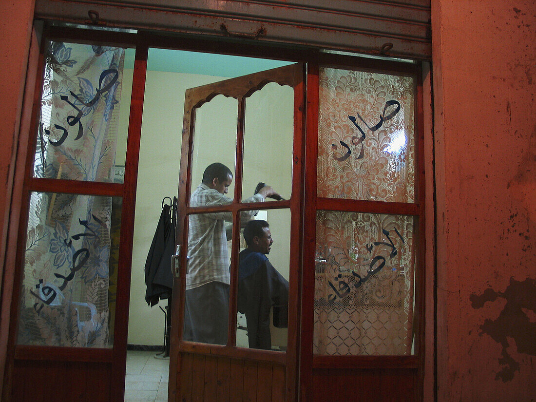 Hairdressers. Tan Tan beach. Morocco.