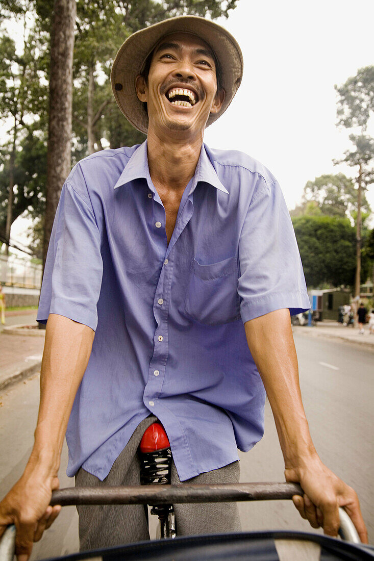 Pedicab driver. Ho Chi Minh city. Vietnam.