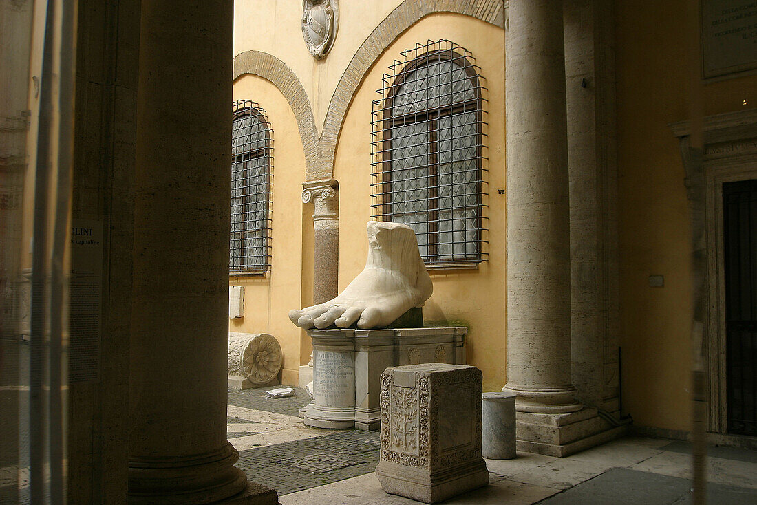 Foot of statue of Emperor Constantine II at courtyard of Palazzo dei Conservatori, Capitoline Museum. Rome. Italy
