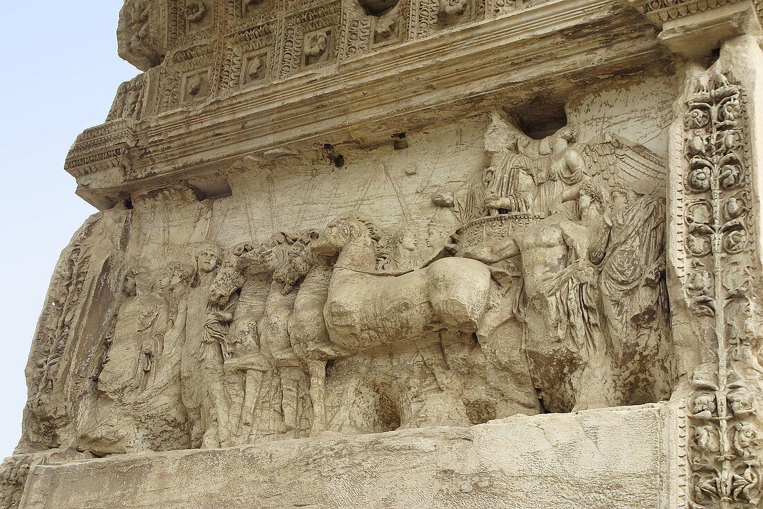 Frieze of Titus riding chariot in triumph. Arco de Tito. Roman Forum. Rome. Italy