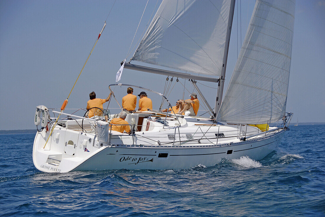 The annual sailboat race between Port Huron and Mackinaw Island Michigan requires teamwork.