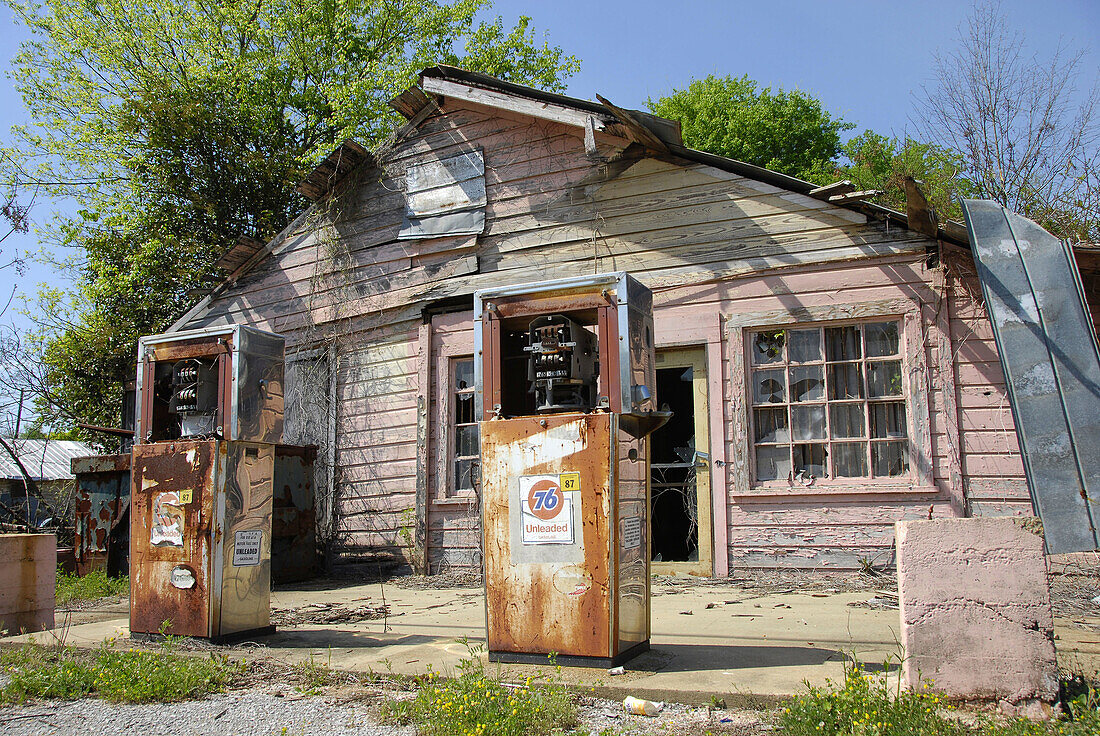Old run down gas station with rusted pumps on the road from Selma to Montgomery. Alabama. USA.