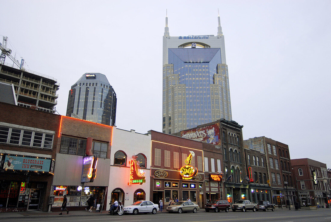 Neon Signs along Streets and Bell South Building in Nashville. Tennessee. USA.