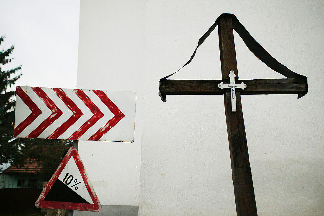Traffic sign and cross, Romania