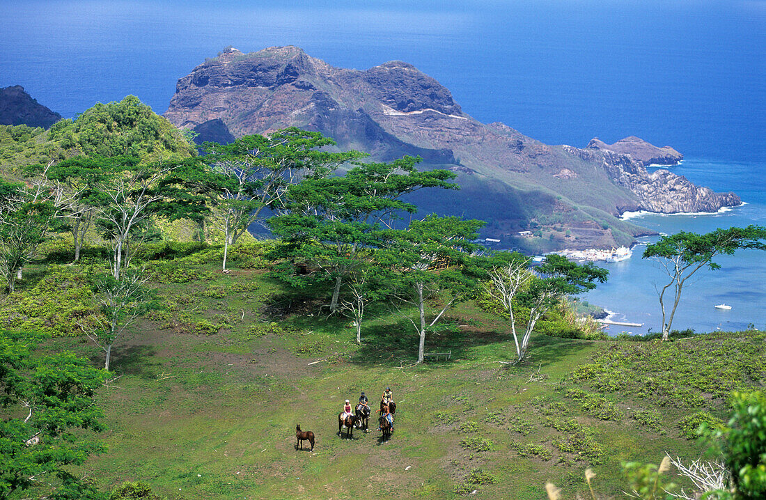 Horese riders near Muake Saddle on the island of Nuku Hiva, French Polynesia
