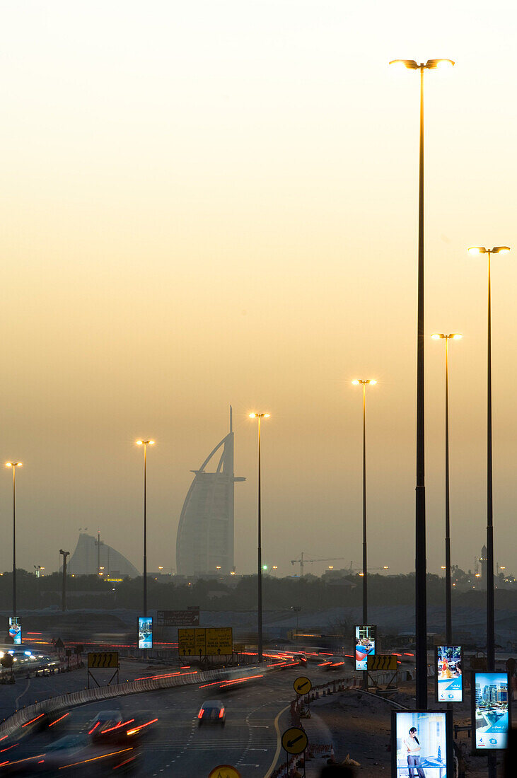 Dubai skyline in the evening light, Burj al Arab in the background, Traffic chaos, Dubai, United Arab Emirates