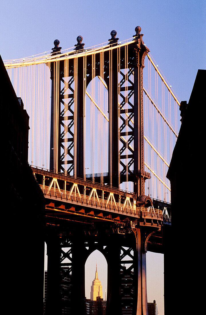 Manhattan Bridge and Empire State Building at the background. Manhattan. New York City. USA.