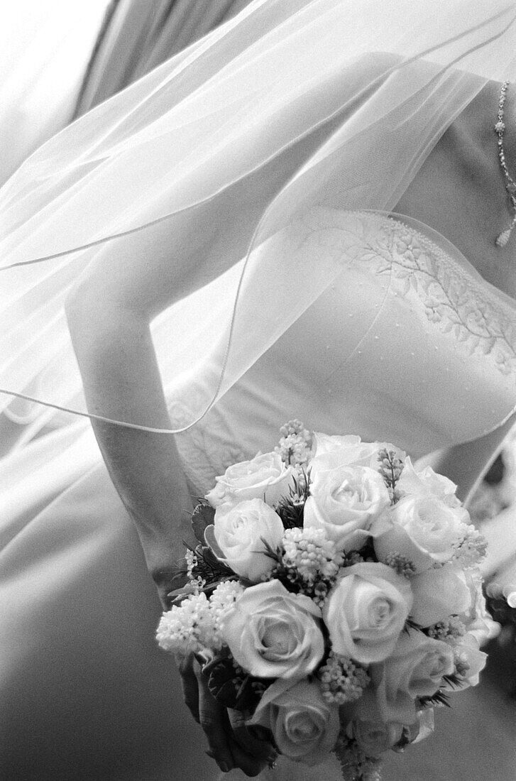 Adult, Adults, Anonymous, B&W, Black-and-White, Bouquet, Bouquets, Bride, Brides, Ceremonies, Ceremony, Contemporary, Daytime, Delicate, Detail, Details, Dress, Dressed up, Dresses, Elegance, Elegant, Female, Flower, Flowers, Hold, Holding, Human, Indoor,