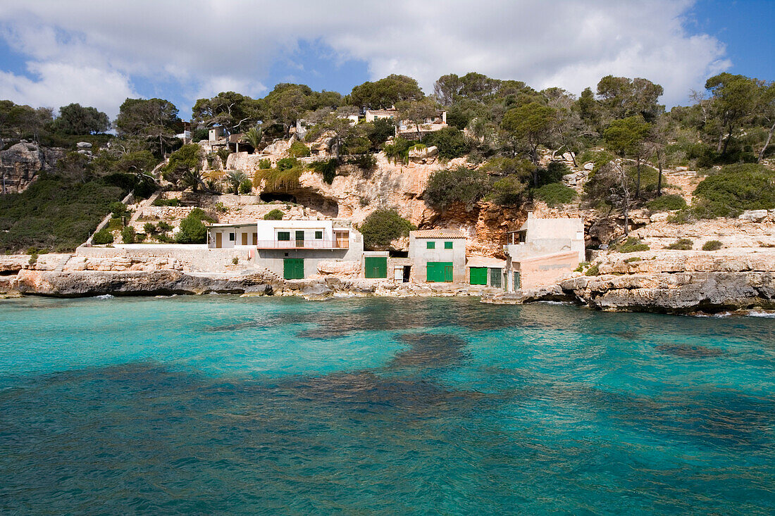 Fishing Boat Garages at Cala Llombards Cove, Cala Llombards, Mallorca, Balearic Islands, Spain