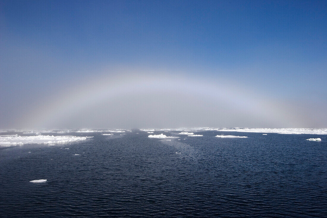 mistbow over icefloes, Spitsbergen, Norway