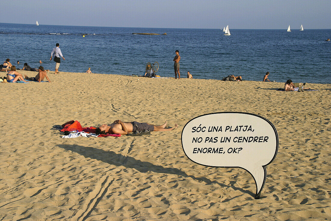 Campaign against butt throw around the beach. Barcelona. Catalonia. Spain.