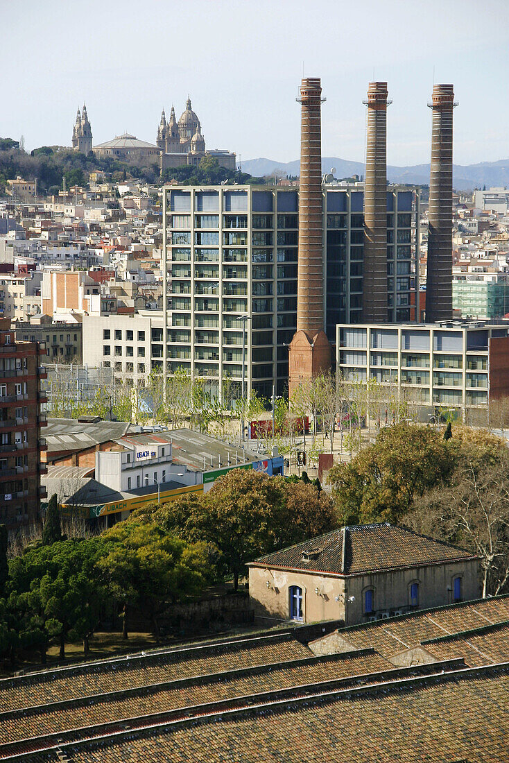 Tres Xemeneies former industrial complex at Avinguda del Paral.lel. Montjuic in background. Barcelona. Spain