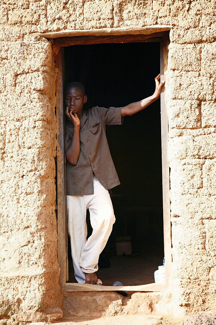 Reflexive boy at Kibidwe quarter, Bobo Dioulasso. Burkina Faso