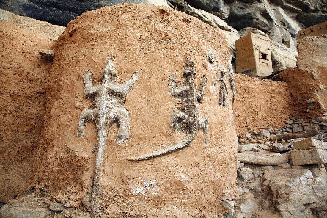 Fetish at old Tellem dwellings built into the face of the Bandiagara Escarpment. Dogon Country, Mali