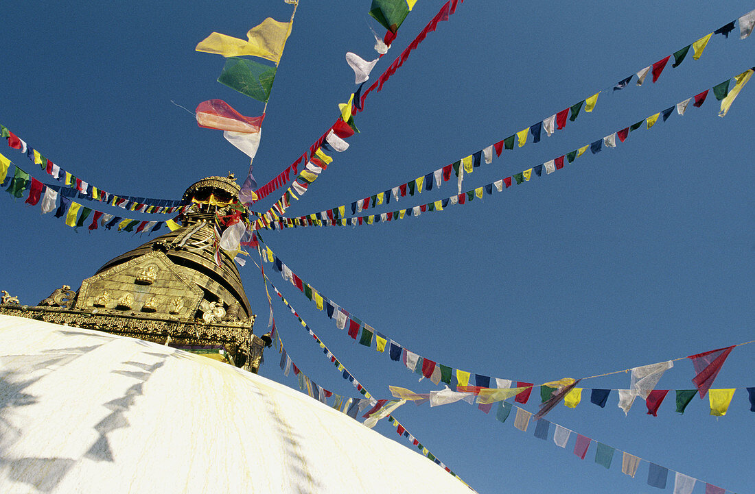 Coloured prayer flags leading to the top of Svayambunath called Monkey Temple, Kathmandu, Nepal.