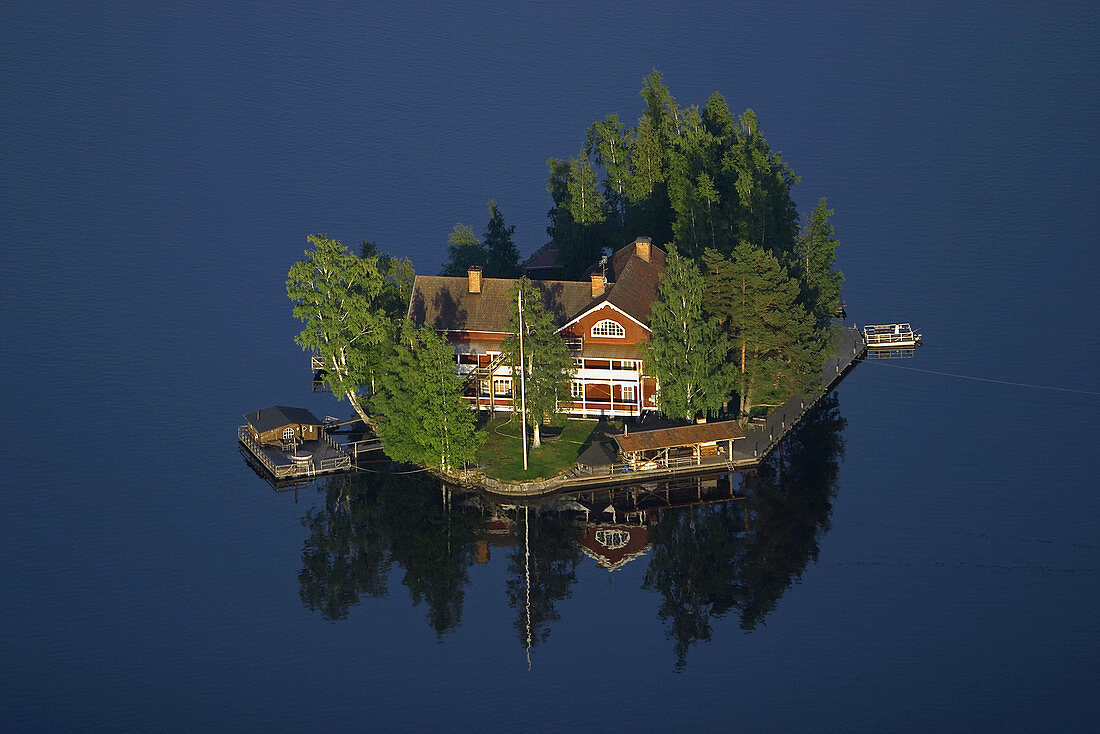 Big house on small island in lake. Söderhamn. Sweden