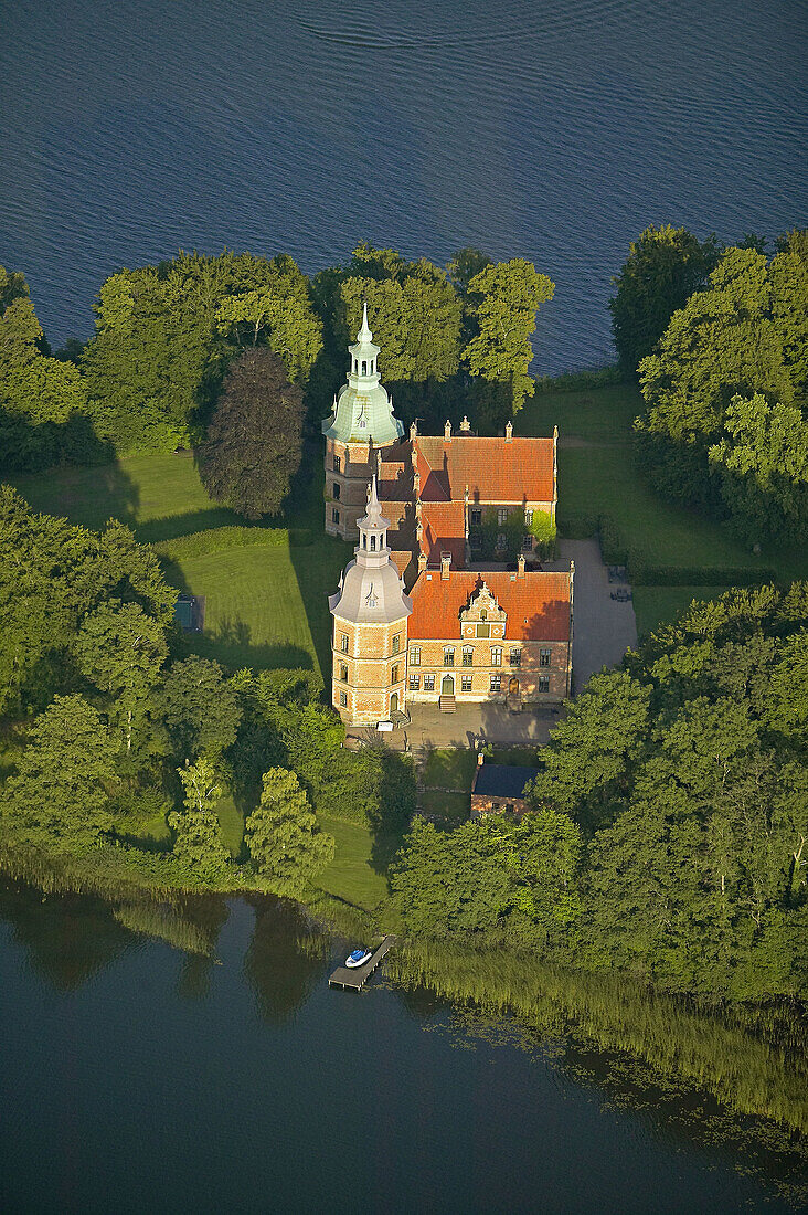 Old historical castle, lake, aerial view. Karsholm. Skåne. Sweden.