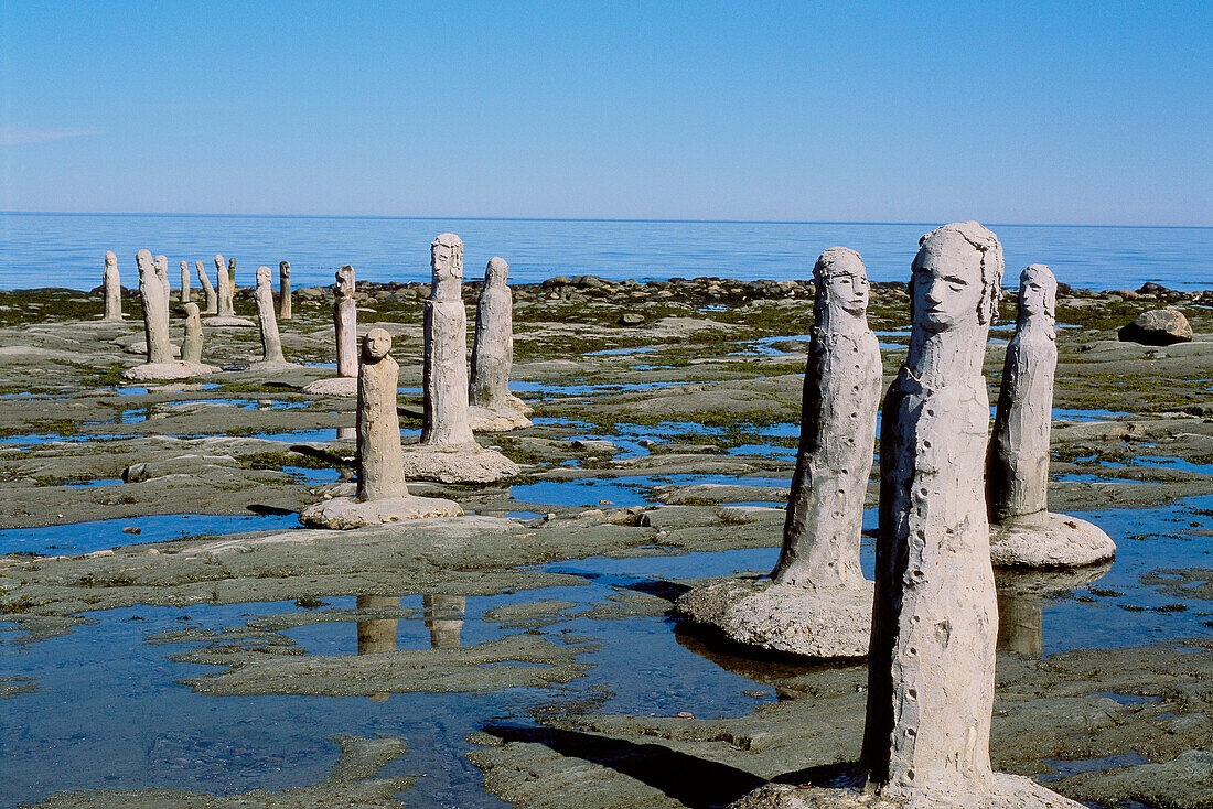 Cement sculptures on beach. Sainte-Flavie. Quebec. Canada.